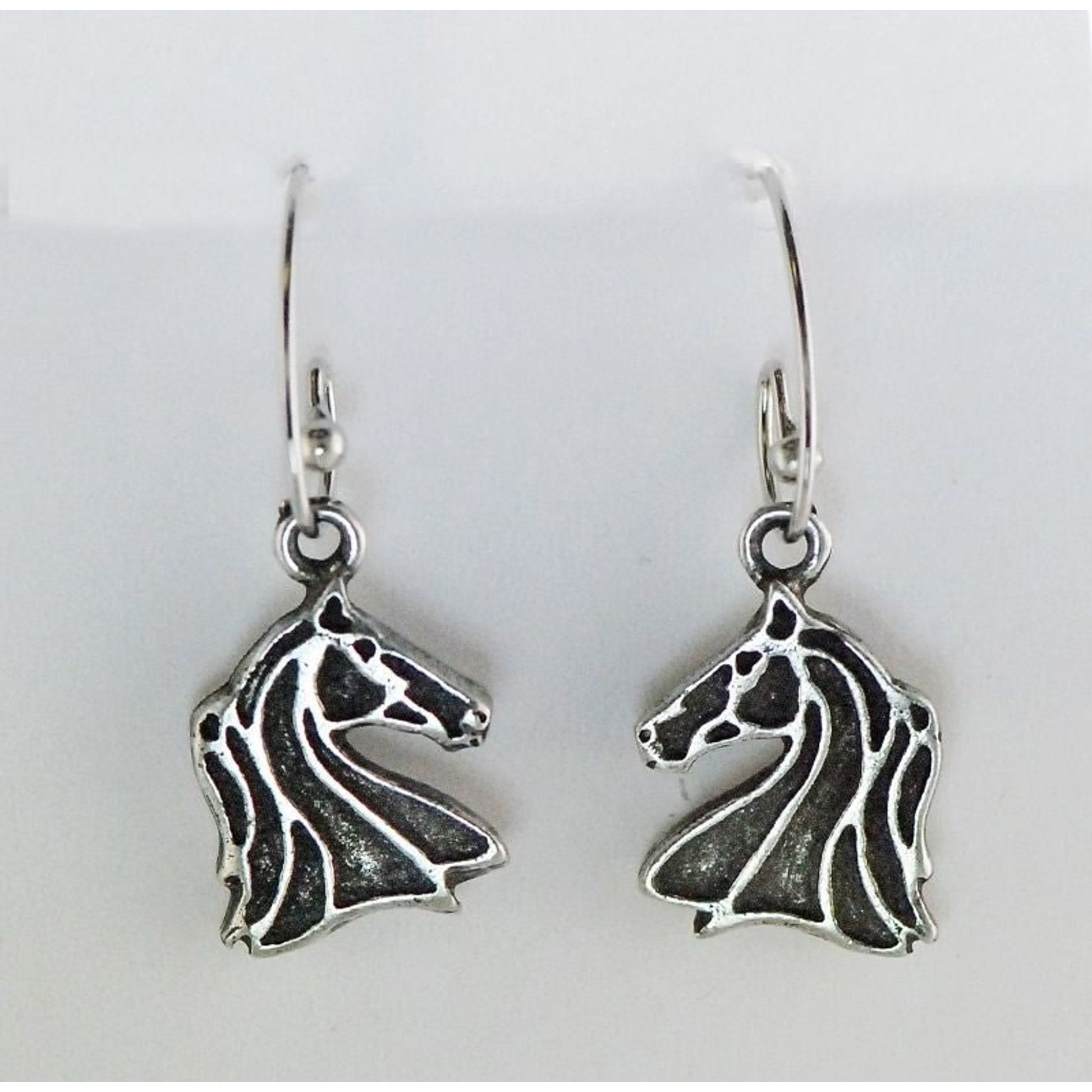 Finishing Touch Wire Outline Hrs Head Earrings